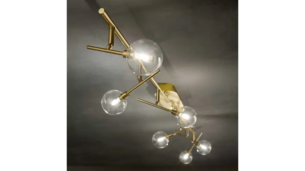 Lampada da parete Maracas in metallo rifinito in ottone satinato con diffusori orientabili in vetro soffiato trasparente di Ideal Lux