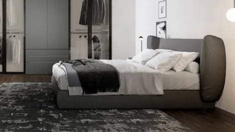 Letto in tessuto imbottito con testiera avvolgente e  box contenitore Wings di Dielle Modus