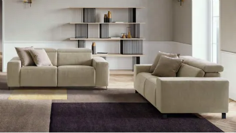 Divano lineare con movimento relax in tessuto Sebastian di Le Comfort