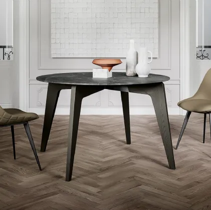 Tavolo rotondo Magic con top in laminato e gambe in massello di Frassino verniciato di Arredo3
