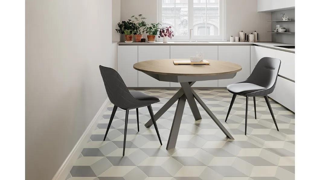 Tavolo rotondo allungabile Twist con top in laminato e gambe in metallo verniciato di Arredo3
